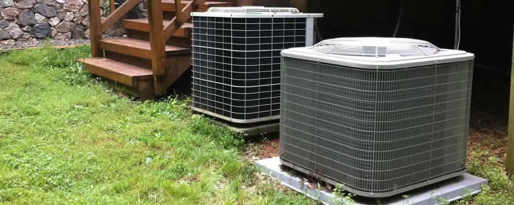 Heat pump installation and service units outside a home in Grand Rapids, MI